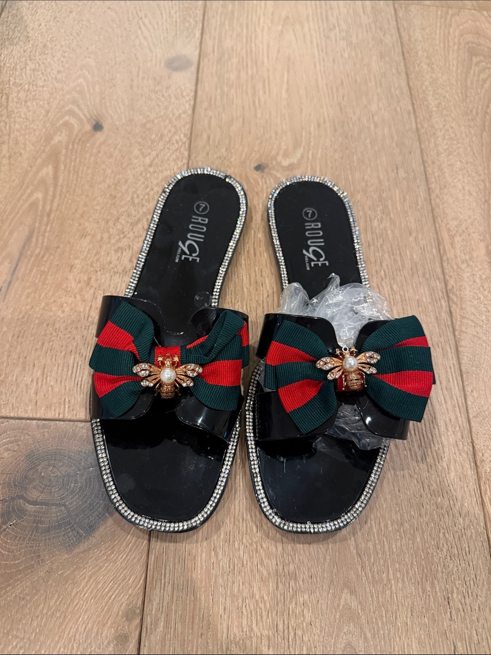 Rouge Helium Black Slide Sandals with Red & Green Striped Bow and Bee